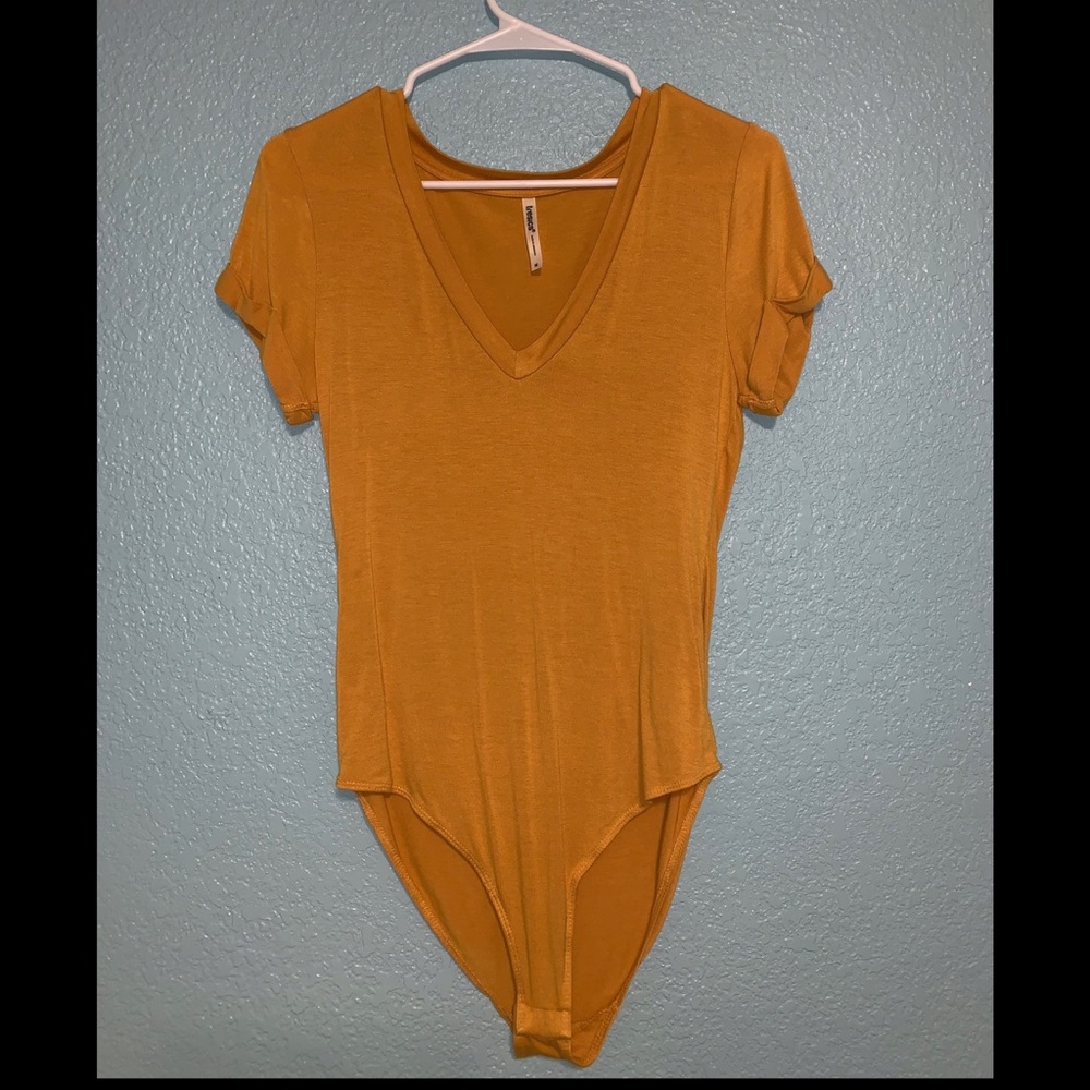 Yellow bodysuit